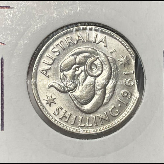 1961 Australian Shilling Error Clipped Edge GEM